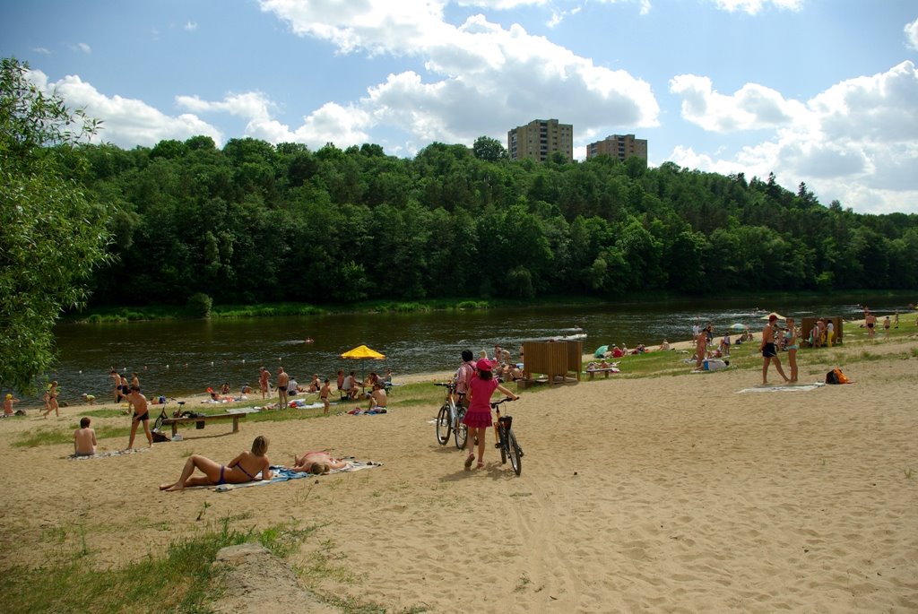 People chilling at Valakampiai Beach in Vilnius